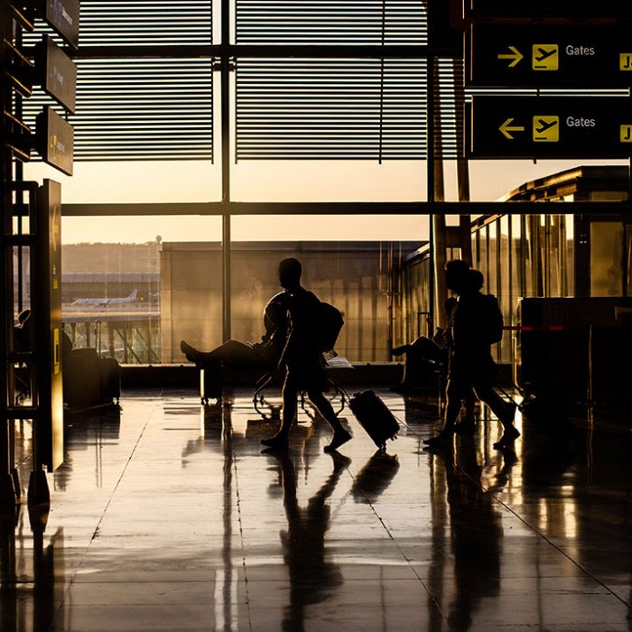 people-walking-inside-airport-terminal